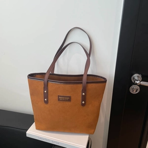 Brown vintage suede tote bag with large capacity and contrasting dark leather handles