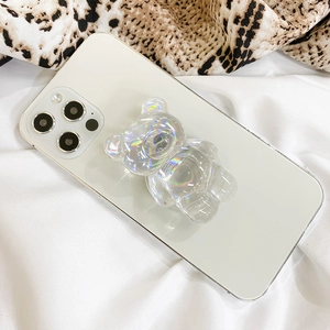 Supporto per telefono a forma di orso 3D iridescente su smartphone bianco