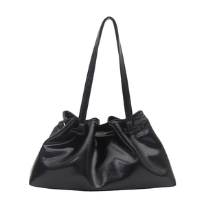 Minimalist black glossy faux leather tote bag with pleated drawstring design and large capacity