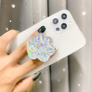 Detail view of transparent cat paw phone socket with vibrant aurora laser effect