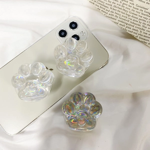 Detail view of cat claw phone sockets with iridescent laser finish on white background