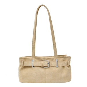 Retro beige suede underarm bag with a vintage silver buckle strap design on white background