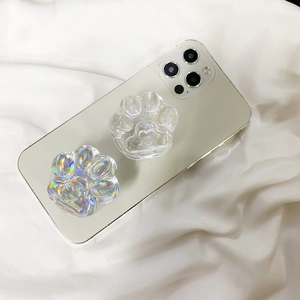 Detailed view of holographic cat paw phone sockets with heart accent on a smartphone