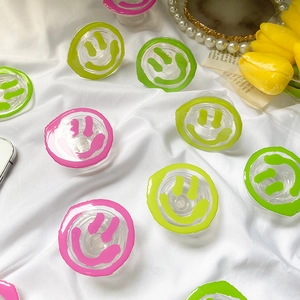 Transparent acrylic cell phone grip with cute cartoon smile pattern in pastel colors