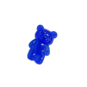 Translucent dark blue bear phone grip holder with glossy finish on white background