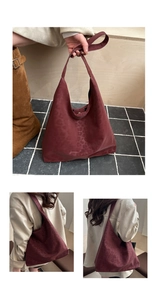 Detail view of burgundy leopard print hobo bag with high quality suede texture and wide strap