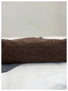 Detailed close-up showing the leopard print fabric texture and sturdy stitching on the tote bag