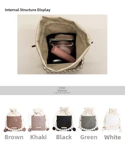 Detail of drawstring bucket bag showing interior storage and multi-color pearl handle options