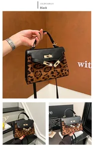 Detailed view of leopard print texture and golden twist lock on a trapezoid handbag