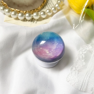 Nebula galaxy pattern retractable phone socket with purple gradient and glitter finish