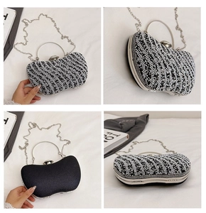 Macro detail of wave-pattern rhinestone evening bag with round metal handle and chain strap
