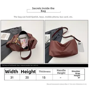Size guide for large brown leather hobo bag showing dimensions and daily storage capacity