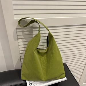 Large green leopard print hobo tote bag with wide shoulder strap for casual commute