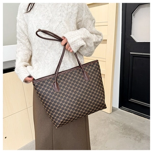 Detailed view of vintage pattern tote bag showing large capacity and shoulder strap