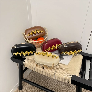 Chic semi-oval clutch bags with wavy gold metal trim in five elegant color options