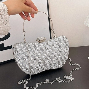 Elegant silver square clutch with sparkling crystals, pearls, and a large diamond clasp