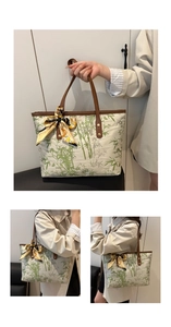 Detail of canvas tote bag featuring green bamboo print and stylish yellow silk scarf accessory