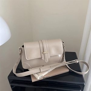 Classic beige PU leather crossbody bag with adjustable strap and gold metal trim