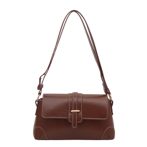 Deep brown matte faux leather shoulder bag with white contrast stitching and gold buckle