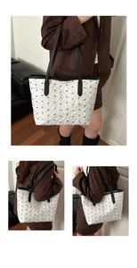 Detailed views of a white pleated tote bag featuring delicate black bow patterns and slim straps