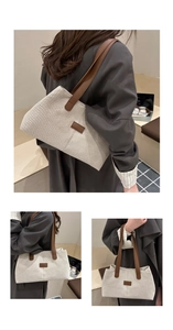 Detail of canvas tote bag with brown leather straps for daily commute and styling