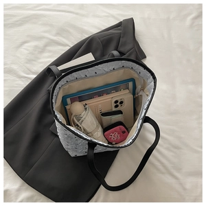 Top view of large floral tote bag interior showing ample space for iPad and essentials