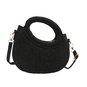 Sparkly black crescent handbag with circular top handle and detachable gold-tone strap