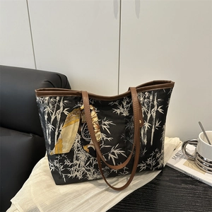 Chic retro canvas tote bag with bamboo print, leather handles and decorative silk scarf