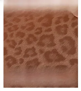 Detailed macro view of the brown leopard print faux fur texture on a large tote bag