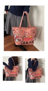 Pink leather tote bag featuring artistic cartoon bear graffiti and long shoulder straps