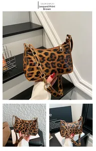 Detail of leopard print shoulder bag featuring gold chain strap and metallic zipper