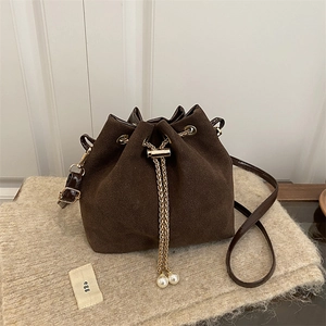 Brown frosted leather drawstring bucket bag with gold chain and pearl accents