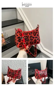 Macro view of red leopard pattern baguette bag with stylish acrylic chain strap