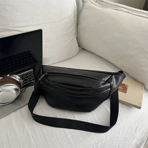 Versatile black lychee pattern leather chest bag with adjustable strap for urban leisure