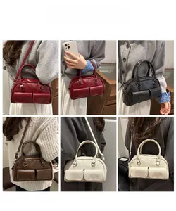 Detailed views of versatile Boston bowling bags in red, black, brown, and cream white