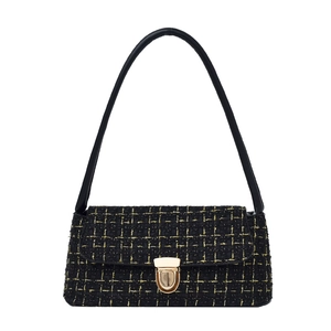 Classic black tweed crossbody bag with gold metallic lock and elegant leather strap
