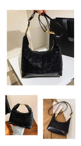 Close-up of leopard print shoulder bag with gold buckle and adjustable strap detail