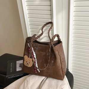 Retro brown large capacity tote bag with woven handles and a cute bear charm