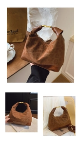Macro shot of leopard print handbag featuring suede texture and gold rectangular buckle