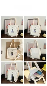 Detail views of canvas tote bag showing spacious interior and detachable shoulder strap