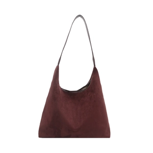 Large burgundy suede tote bag with brown leather shoulder straps on white background