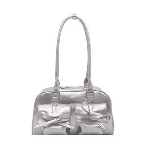 Y2K silver metallic shoulder bag with bow accents and dual front pockets