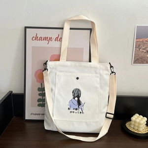 White canvas tote bag with Japanese illustration and adjustable shoulder strap for women