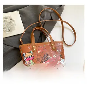 Sac fourre-tout marron en cuir PU avec des imprimés graffiti artistiques et des chats mignons