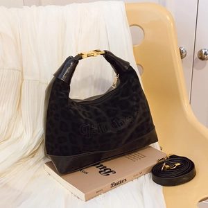 Fashionable black faux suede underarm bag with leopard print and golden buckle detail