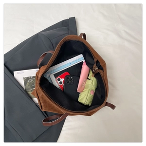 Interior view of leopard tote showing large capacity for tablet, umbrella and essentials