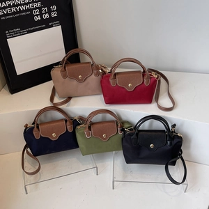 Mini nylon tote bags in five colors with leather handles and crossbody straps