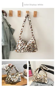 Close-up of fluffy leopard print tote bag in white with soft faux fur texture detail