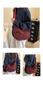 Macro detail of wine red leopard print crossbody bag with vibrant red fabric strap