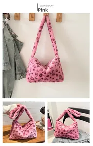 Detailed plush pink leopard print shoulder bag with soft faux fur texture and crescent shape